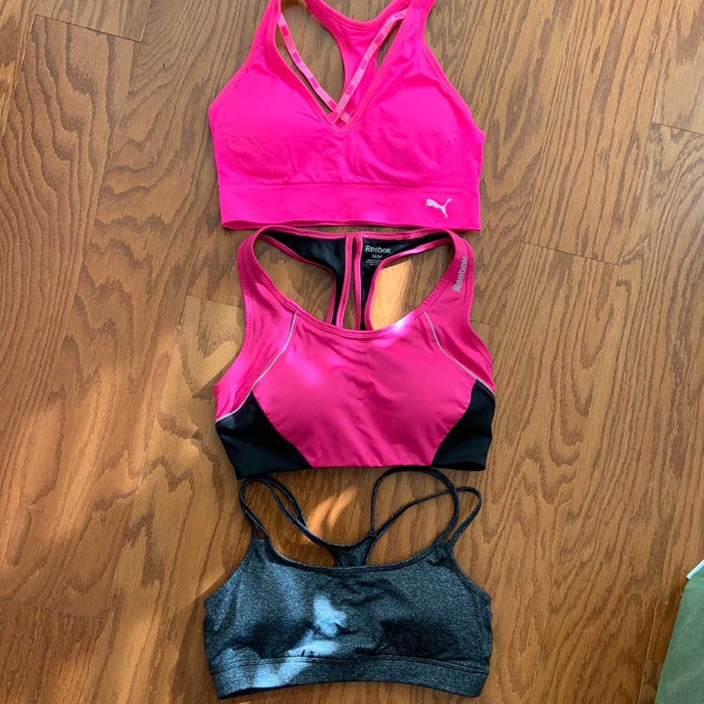 Bundle of 3 Sports Bras - Reebok (pink M), puma (pink M), Gap (gray S).